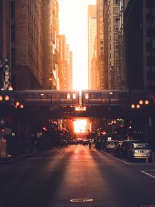 Preview wallpaper city, road, buildings, train, street, sunset