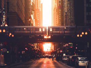 Preview wallpaper city, road, buildings, train, street, sunset