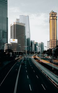 Preview wallpaper city, road, cars, buildings, skyscrapers, markings