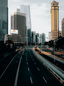 Preview wallpaper city, road, cars, buildings, skyscrapers, markings