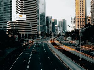 Preview wallpaper city, road, cars, buildings, skyscrapers, markings