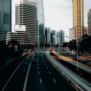 Preview wallpaper city, road, cars, buildings, skyscrapers, markings