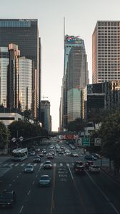 Preview wallpaper city, road, cars, asphalt, skyscrapers