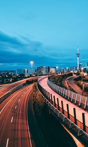 Preview wallpaper city, road, lights, long exposure, buildings, dusk