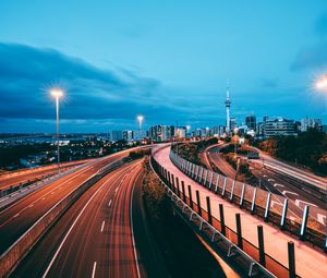 Preview wallpaper city, road, lights, long exposure, buildings, dusk