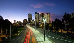 Preview wallpaper city, road, neon, evening
