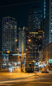 Preview wallpaper city, road, tram, cars, buildings, lights, street