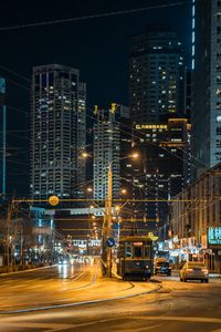 Preview wallpaper city, road, tram, cars, buildings, lights, street