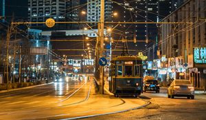 Preview wallpaper city, road, tram, cars, buildings, lights, street