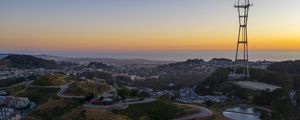 Preview wallpaper city, road, winding, horizon, evening