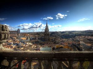 Preview wallpaper city, rocks, sky, style, architecture