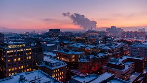 Preview wallpaper city, roof, evening, sky
