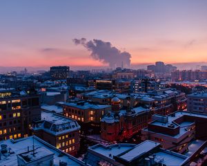 Preview wallpaper city, roof, evening, sky