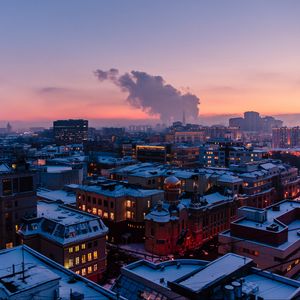 Preview wallpaper city, roof, evening, sky
