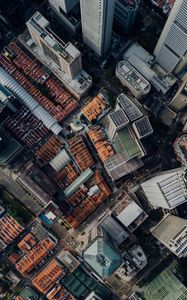 Preview wallpaper city, roofs, buildings, aerial view