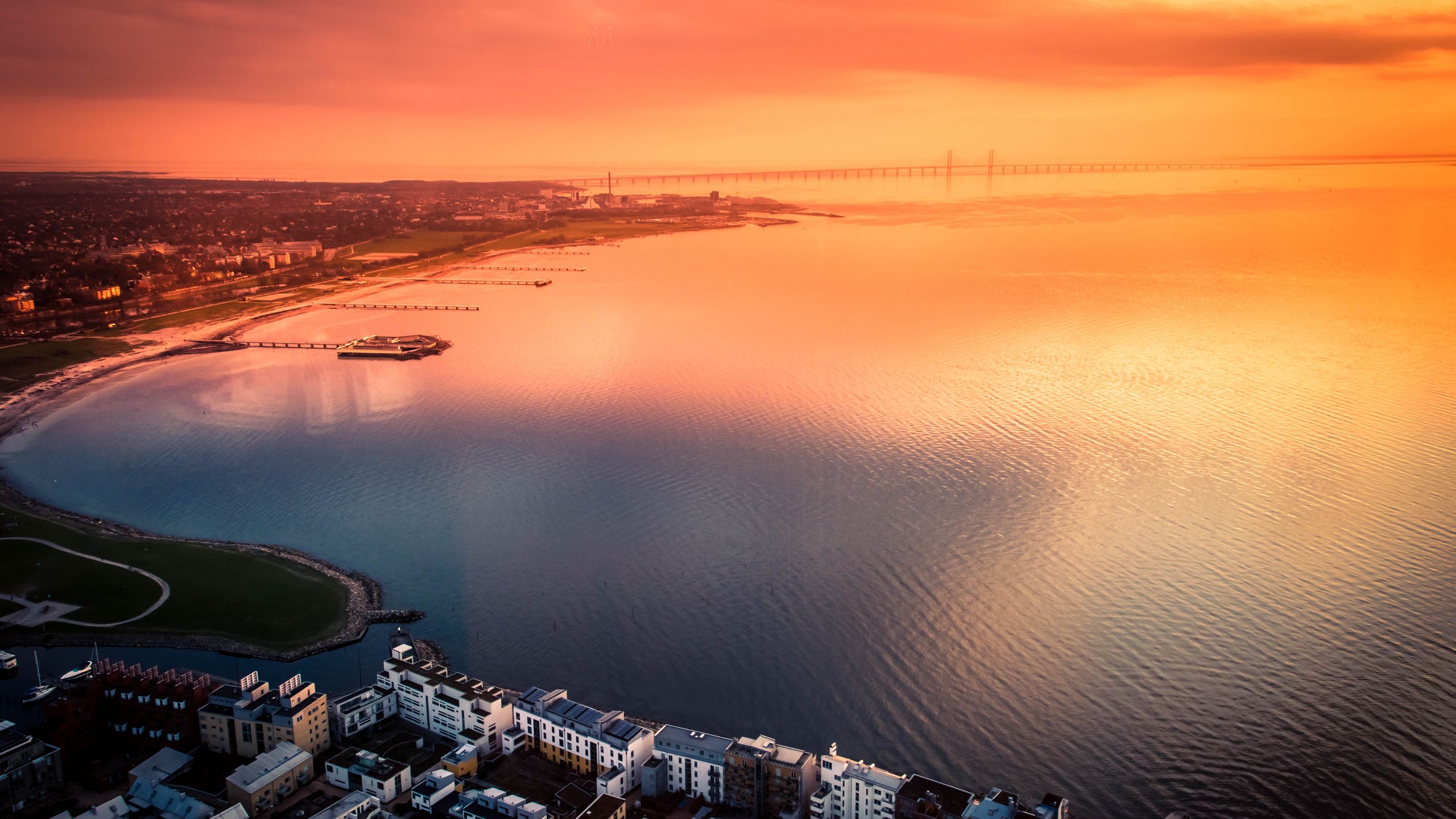 Download wallpaper 2560x1440 city, sea, aerial view, coast, sunset ...