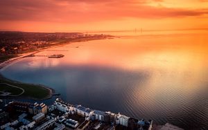 Preview wallpaper city, sea, aerial view, coast, sunset