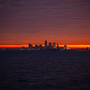 Preview wallpaper city, sea, sunrise, dark