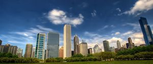 Preview wallpaper city, sky, grass, reflection