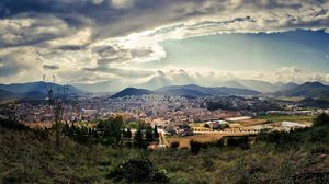 Preview wallpaper city, sky, nature, top view, grass, clouds