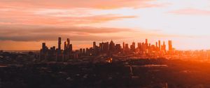 Preview wallpaper city, skyscraper, architecture, sunset, evening