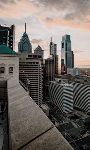 Preview wallpaper city, skyscraper, buildings, architecture, evening, sky