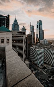 Preview wallpaper city, skyscraper, buildings, architecture, evening, sky