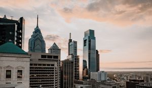 Preview wallpaper city, skyscraper, buildings, architecture, evening, sky