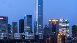 Preview wallpaper city, skyscraper, buildings, lights, twilight