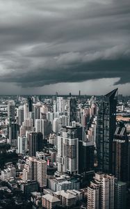 Preview wallpaper city, skyscrapers, aerial view, clouds, overcast