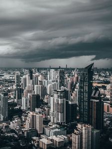 Preview wallpaper city, skyscrapers, aerial view, clouds, overcast