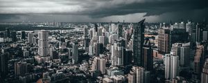 Preview wallpaper city, skyscrapers, aerial view, clouds, overcast