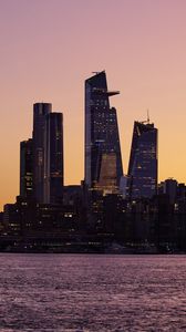 Preview wallpaper city, skyscrapers, architecture, sea, evening