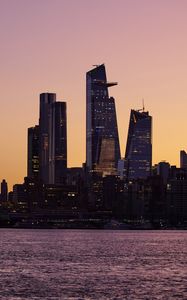 Preview wallpaper city, skyscrapers, architecture, sea, evening
