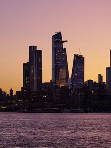 Preview wallpaper city, skyscrapers, architecture, sea, evening