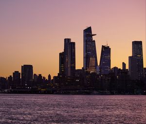 Preview wallpaper city, skyscrapers, architecture, sea, evening