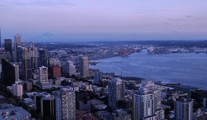Preview wallpaper city, skyscrapers, architecture, evening, buildings, coast