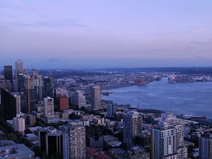 Preview wallpaper city, skyscrapers, architecture, evening, buildings, coast
