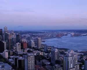 Preview wallpaper city, skyscrapers, architecture, evening, buildings, coast