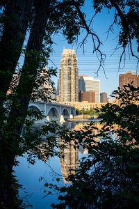 Preview wallpaper city, skyscrapers, bridge, river, reflection, trees, architecture