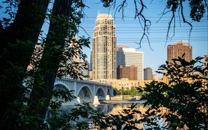 Preview wallpaper city, skyscrapers, bridge, river, reflection, trees, architecture