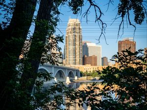 Preview wallpaper city, skyscrapers, bridge, river, reflection, trees, architecture