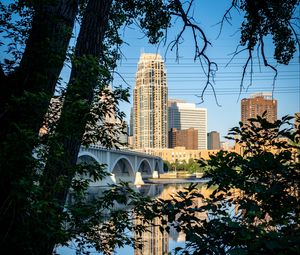 Preview wallpaper city, skyscrapers, bridge, river, reflection, trees, architecture