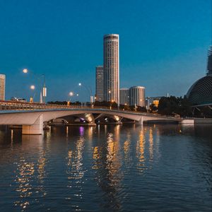 Preview wallpaper city, skyscrapers, bridge, water, lights, twilight