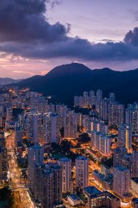 Preview wallpaper city, skyscrapers, buildings, evening, mountains