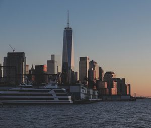 Preview wallpaper city, skyscrapers, pier, water, twilight