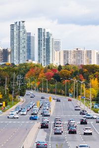 Preview wallpaper city, skyscrapers, road, cars, architecture, trees