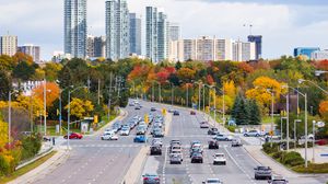 Preview wallpaper city, skyscrapers, road, cars, architecture, trees