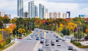 Preview wallpaper city, skyscrapers, road, cars, architecture, trees