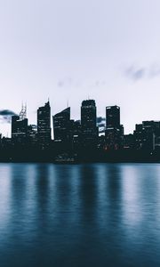 Preview wallpaper city, skyscrapers, shore, evening